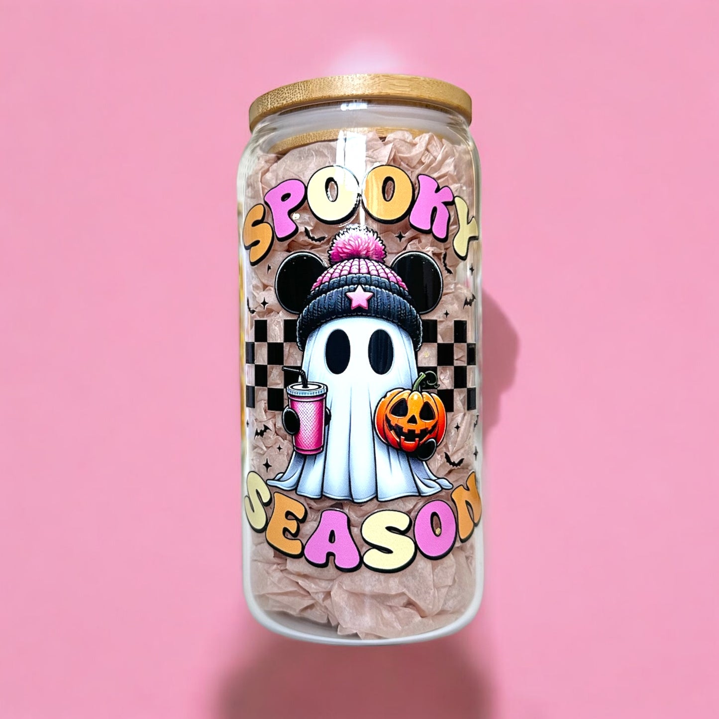 Spooky Season Iced Coffee Glass Cup with ghost design on pink background